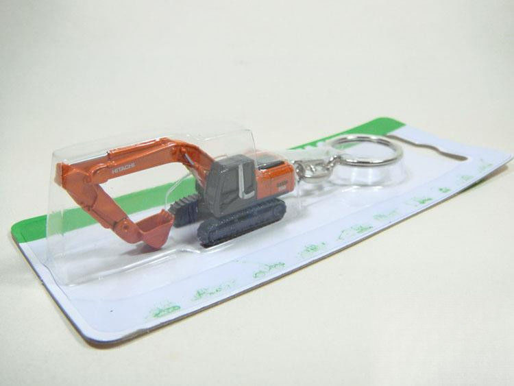 Authentische Schlüsselkette für Bagger mit doppelter Funktion Sammlergeschenk 2,8 cm realistisches Design