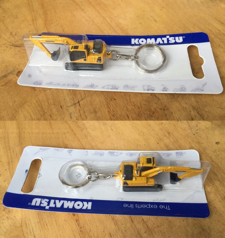 Authentische Schlüsselkette für Bagger mit doppelter Funktion Sammlergeschenk 2,8 cm realistisches Design